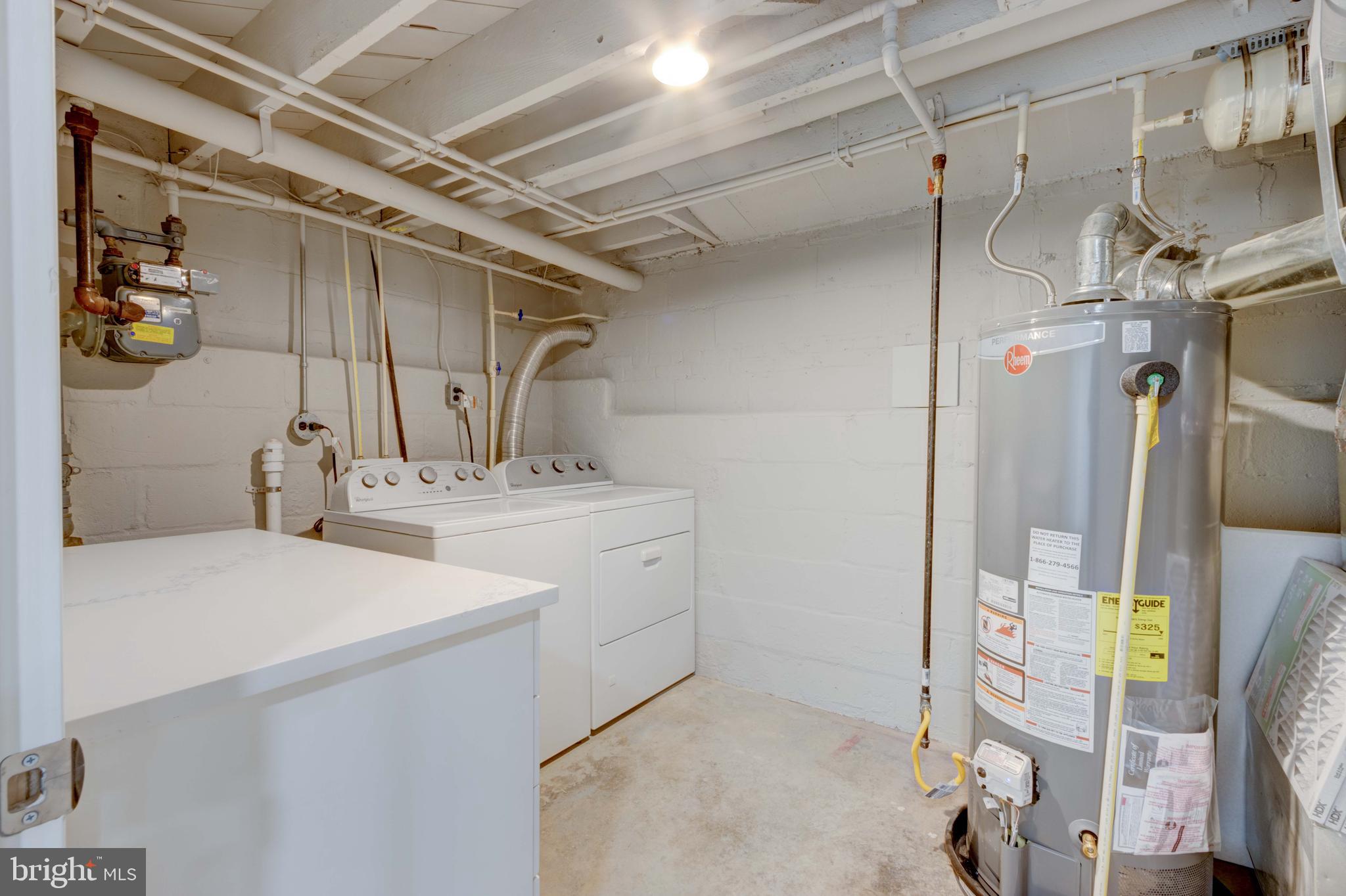 1202 Circle Drive Halethorpe, MD 21227 - Photo 32 of 36 a bathroom with a sink mirror and shower