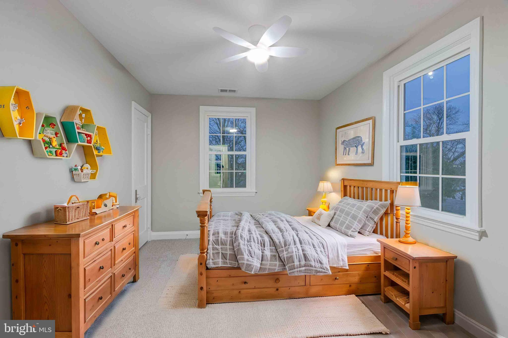 1202 Circle Drive Halethorpe, MD 21227 - Photo 4 of 36 a bedroom with a bed and a window