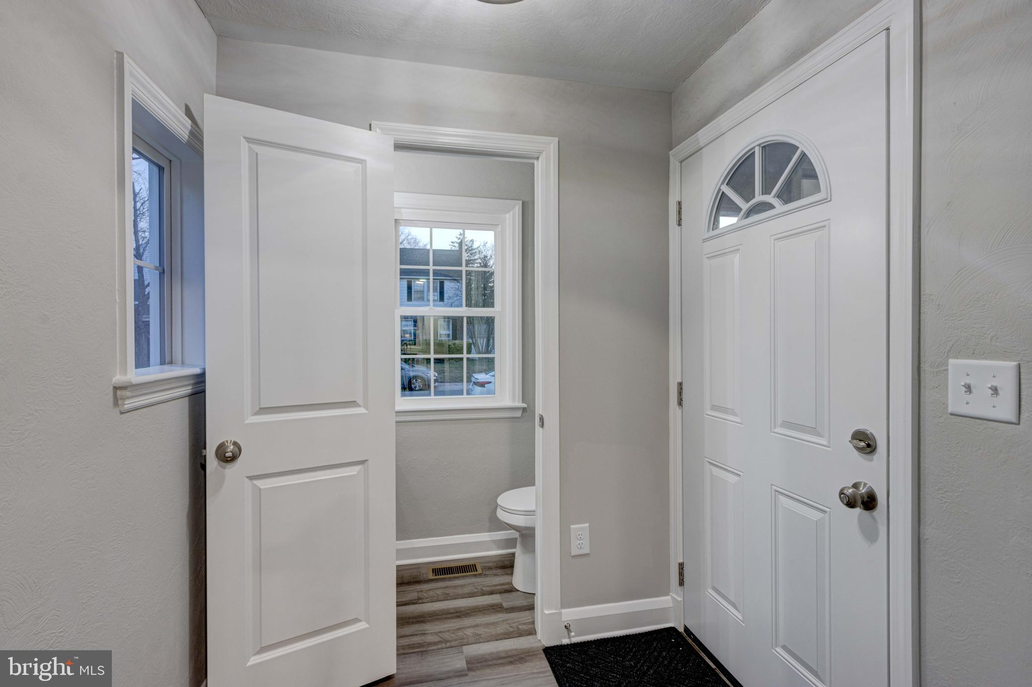 1202 Circle Drive Halethorpe, MD 21227 - Photo 7 of 36 a view of room with window and hardwood floor