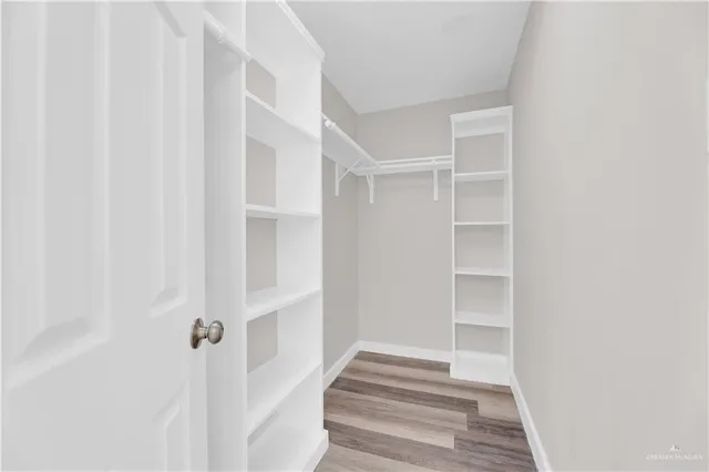 a view of an empty walk in closet