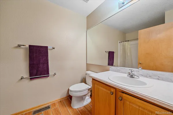 a bathroom with a sink and a toilet