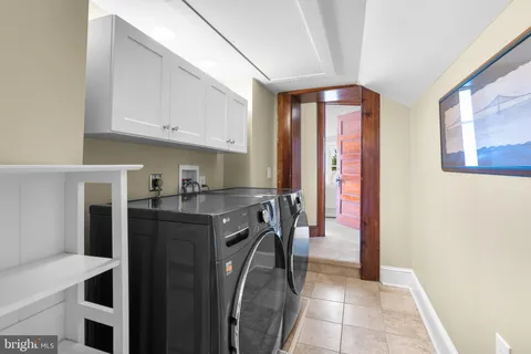 a patio with table and chairs