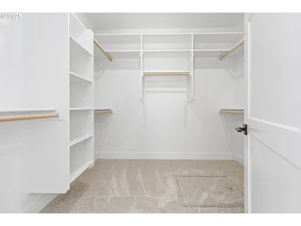 a view of an empty walk in closet