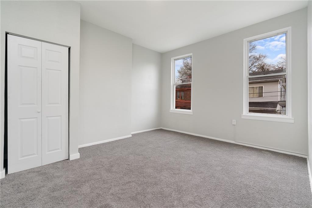 2307 Salisbury Street Pittsburgh, PA 15210 - Photo 9 of 24 a view of an empty room with a window