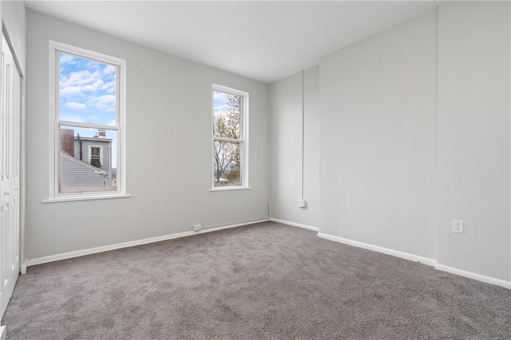 2307 Salisbury Street Pittsburgh, PA 15210 - Photo 10 of 24 an empty room with windows