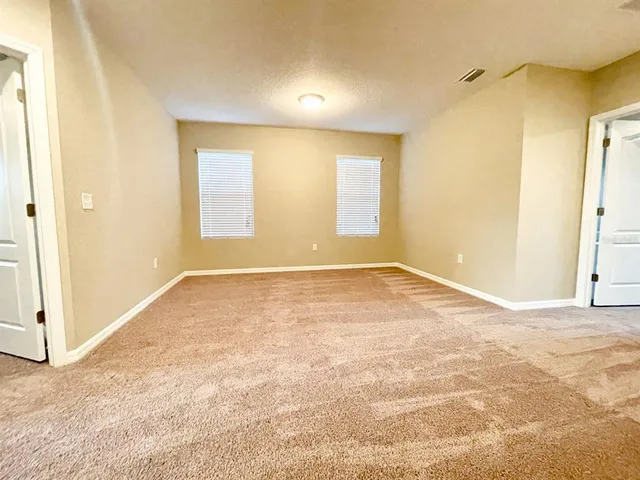 an empty room with a natural light