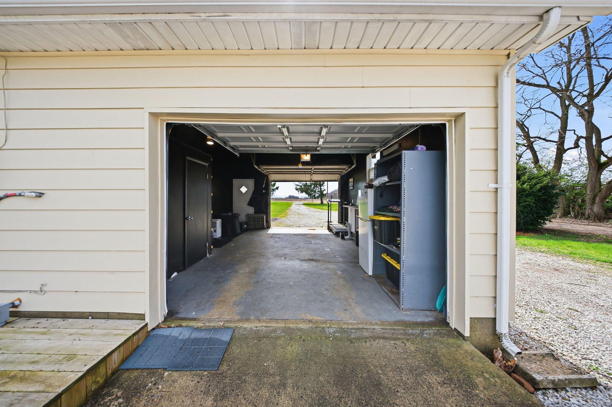9891 Shepherd Road Lockbourne, OH 43137 - Photo 33 of 57 Front & rear garage doors open on attached garage