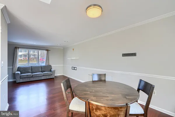 a kitchen with stainless steel appliances a refrigerator sink and microwave