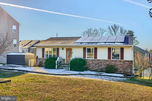 a front view of house with yard