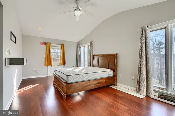 a view of an empty room with a windows