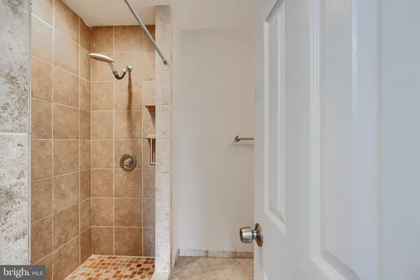 an empty room with closet area