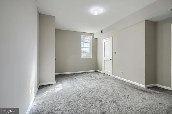 a view of a backyard with a sitting area