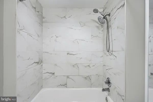 a view of a swimming pool with an ocean view