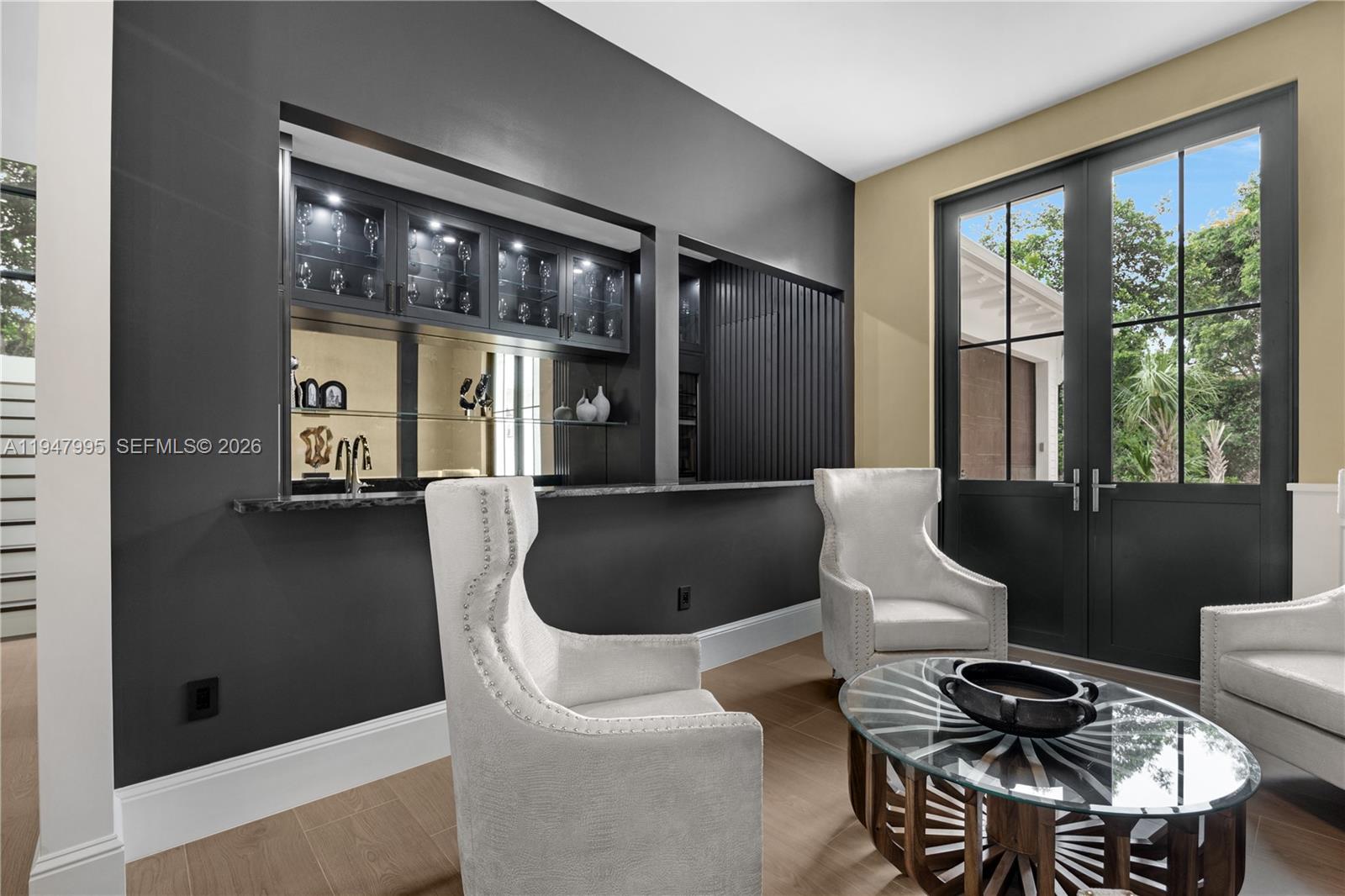 44 Card Sound Road Key Largo, FL 33037 - Photo 13 of 18 a living room with furniture and a window