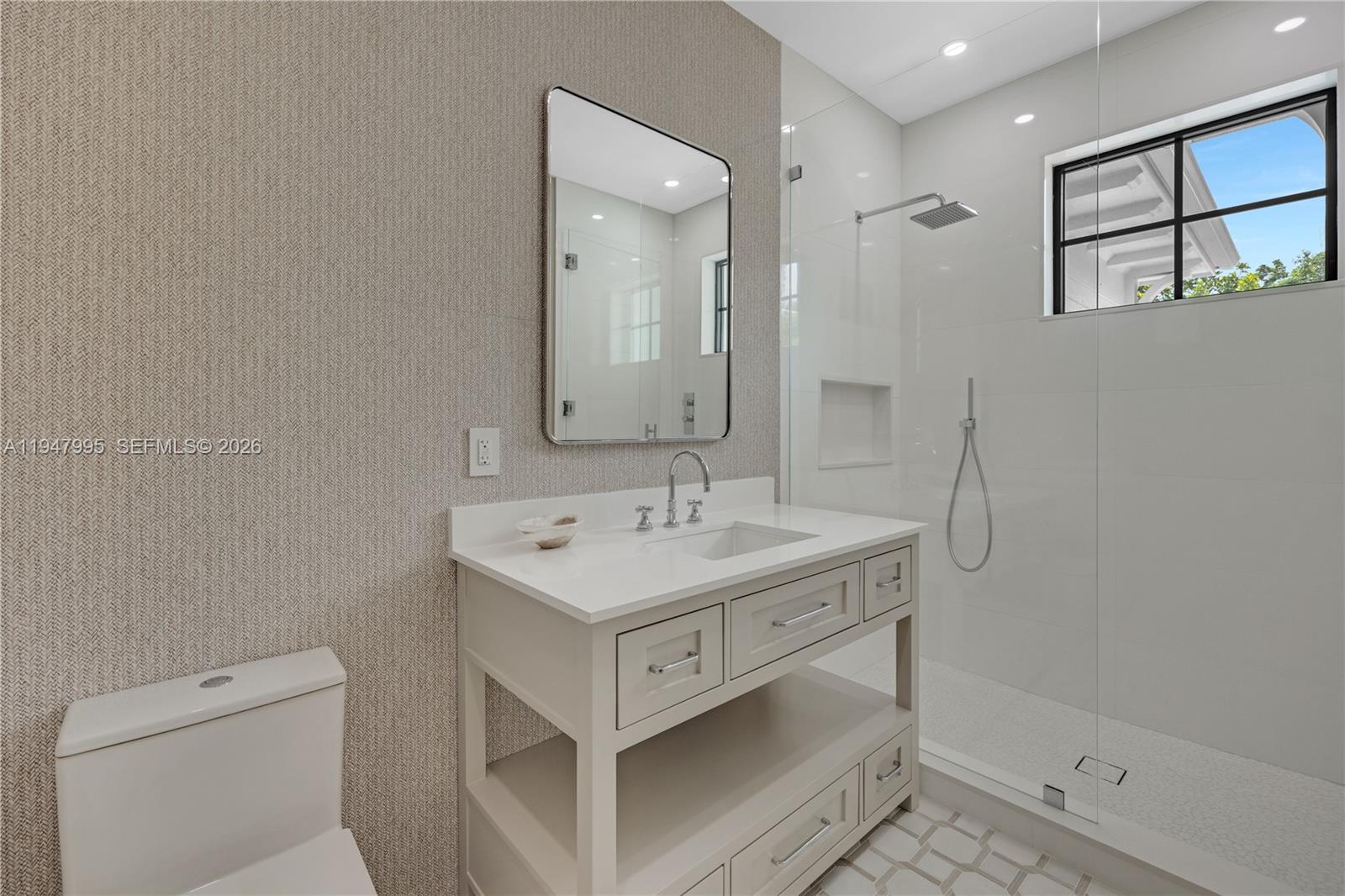 44 Card Sound Road Key Largo, FL 33037 - Photo 7 of 18 a bathroom with a sink toilet and shower