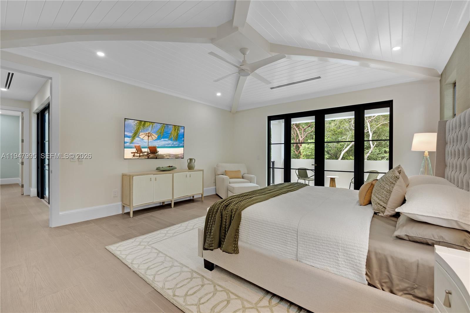 44 Card Sound Road Key Largo, FL 33037 - Photo 8 of 18 a bedroom with a bed and a large window