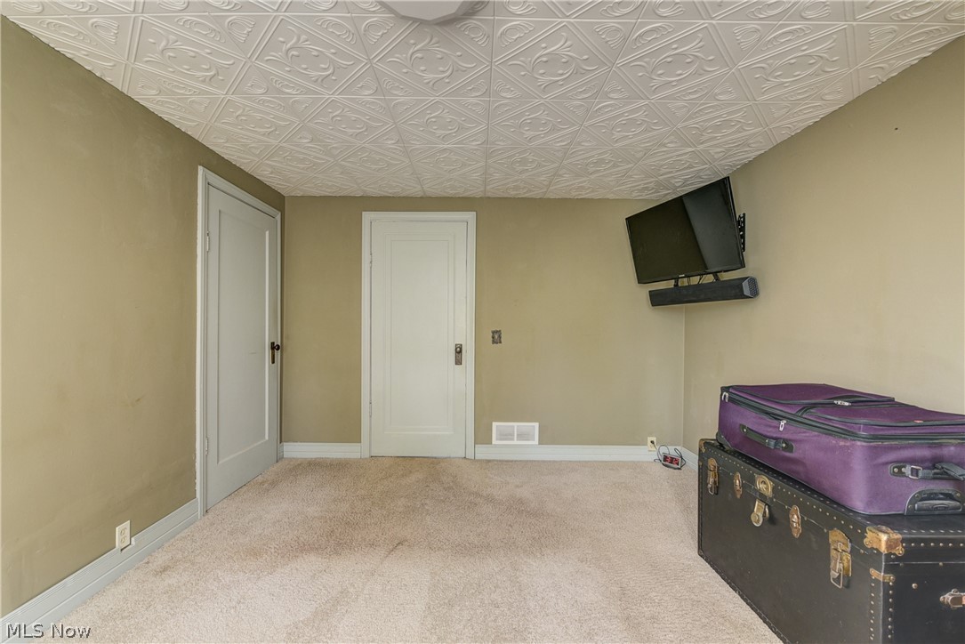 343 Bellus Road Hinckley, OH 44233 - Photo 25 of 49 First Floor bedroom 1 with carpeting