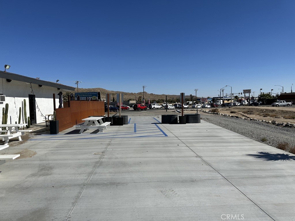 7428 Acoma Trail, Unit 2 Yucca Valley, CA 92284 - Photo 12 of 15 a view of outdoor space with seating area