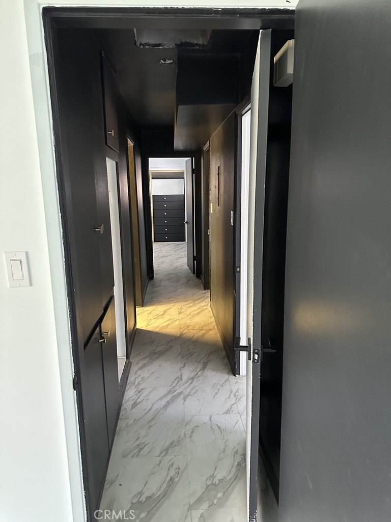 7428 Acoma Trail, Unit 2 Yucca Valley, CA 92284 - Photo 14 of 15 a view of swimming pool from a hallway