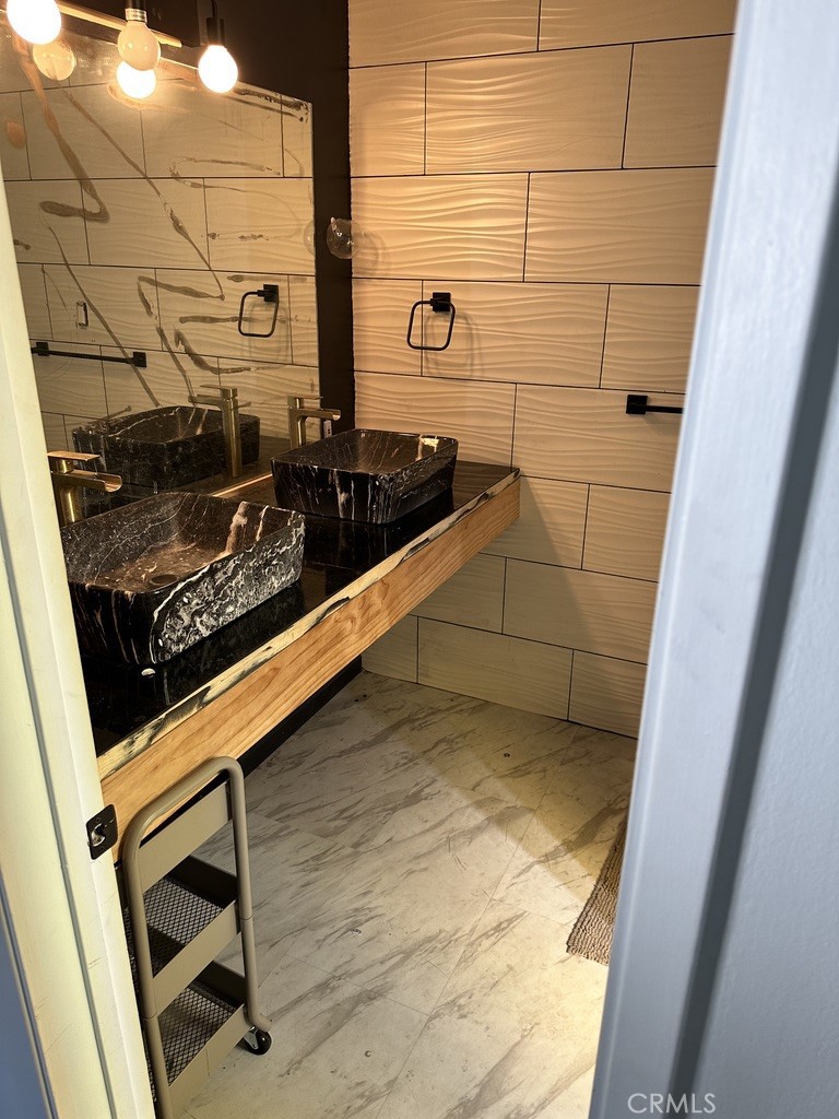 7428 Acoma Trail, Unit 2 Yucca Valley, CA 92284 - Photo 7 of 15 a bathroom with a sink