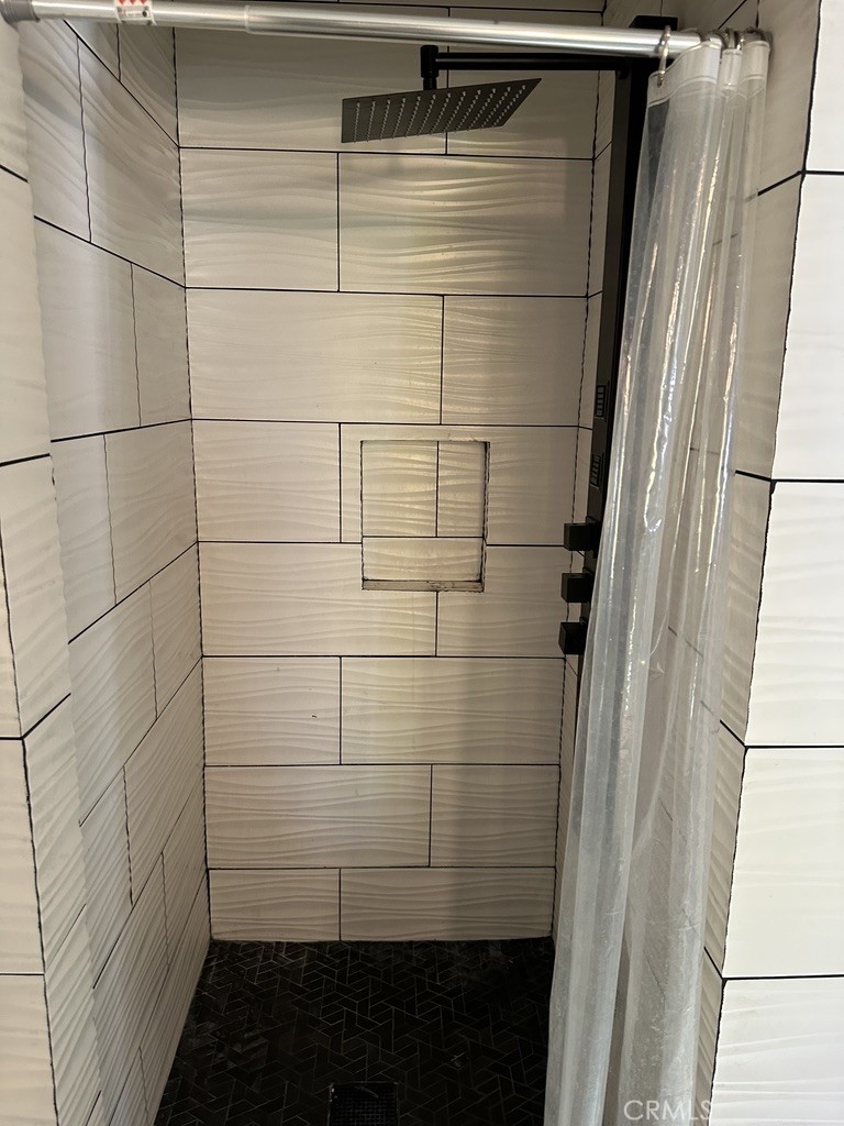 7428 Acoma Trail, Unit 2 Yucca Valley, CA 92284 - Photo 8 of 15 a bathroom with a shower