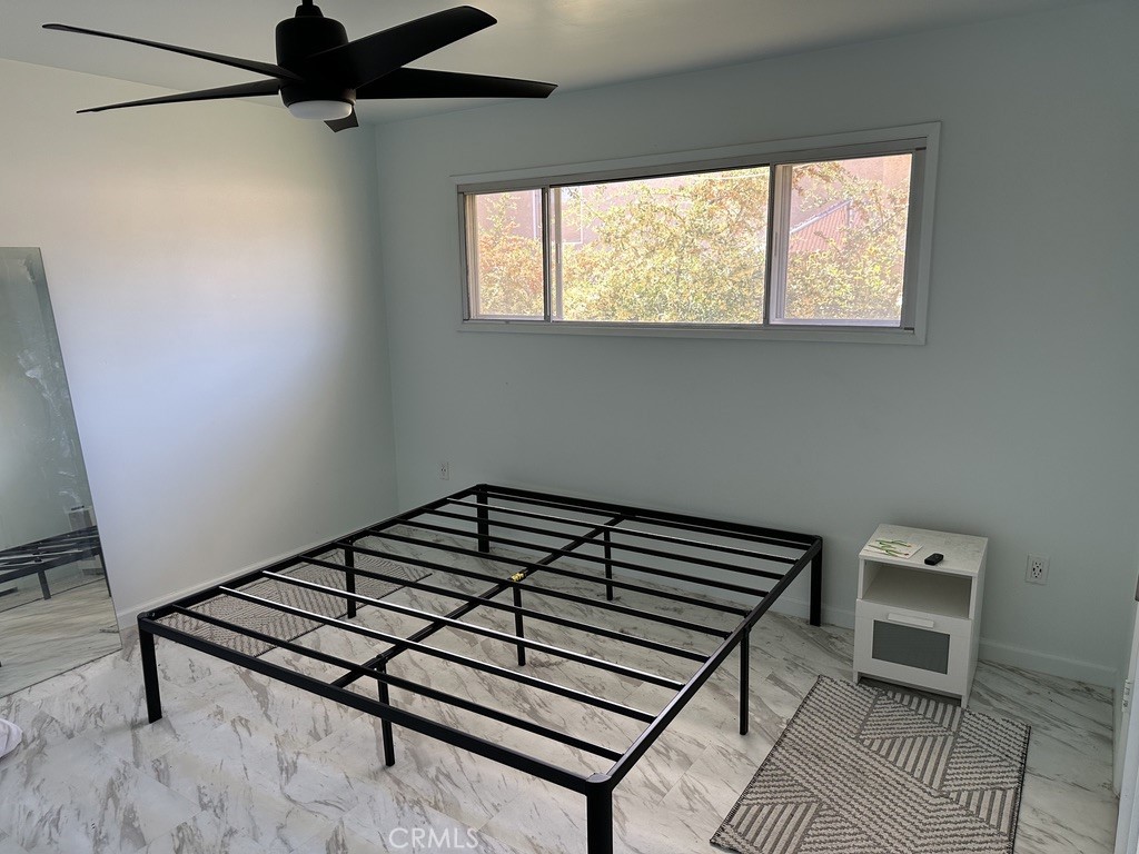 7428 Acoma Trail, Unit 2 Yucca Valley, CA 92284 - Photo 9 of 15 a view of entryway with stairs and a window