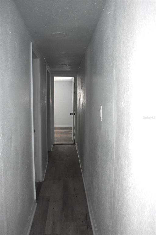 1954 Boat Club Road Oviedo, FL 32765 - Photo 11 of 20 a view of a hallway with wooden floor