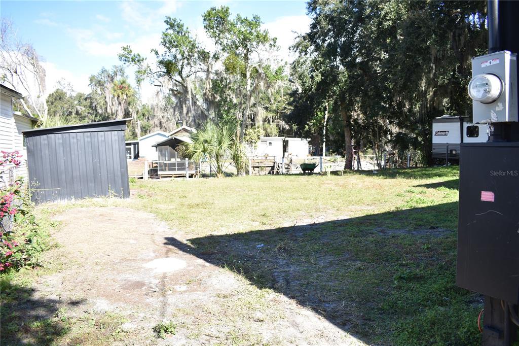 1954 Boat Club Road Oviedo, FL 32765 - Photo 4 of 20 a view of a house with a yard