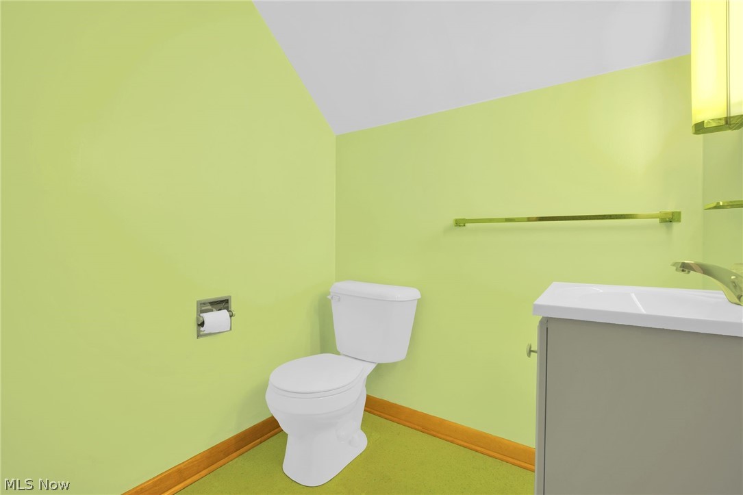 4820 15th Street Northwest Canton, OH 44708 - Photo 25 of 28 Half bath with vanity and toilet