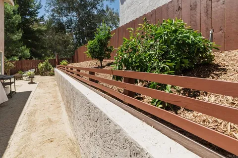 a view of a balcony with chairs