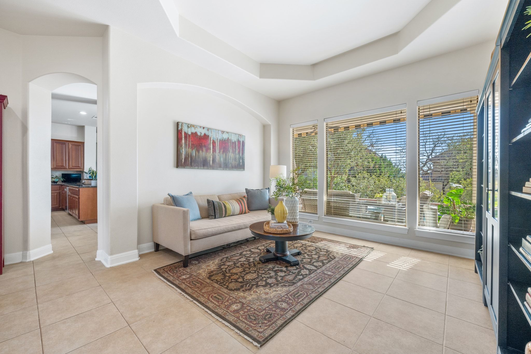 15201 Bat Hawk Circle Austin, TX 78738 - Photo 13 of 33 a living room with furniture and a large window