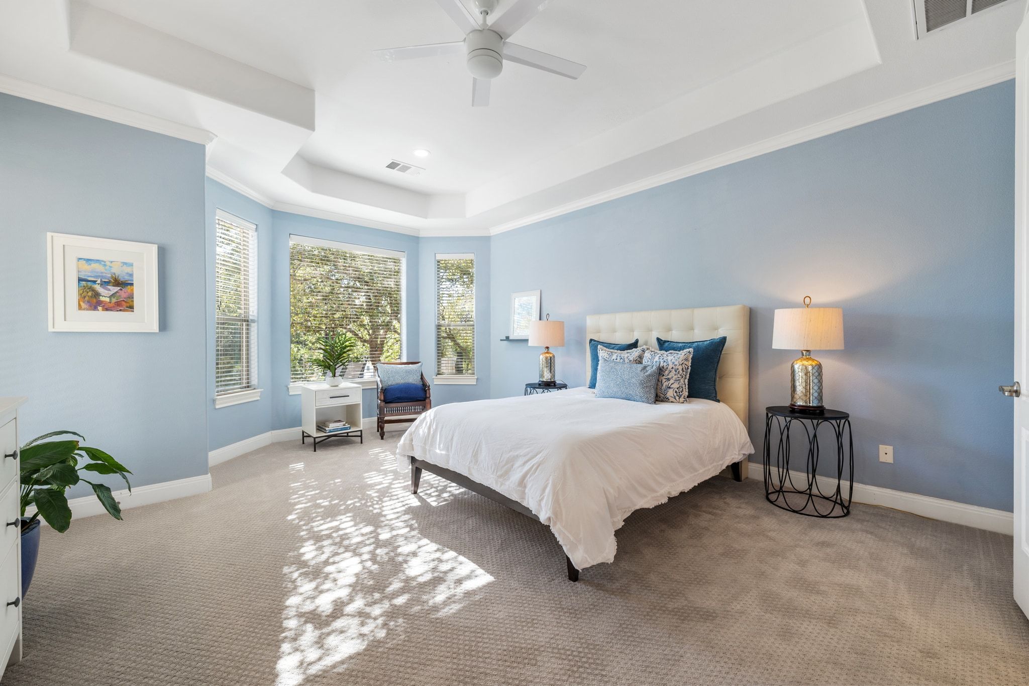 15201 Bat Hawk Circle Austin, TX 78738 - Photo 14 of 33 a spacious bedroom with a bed and a window
