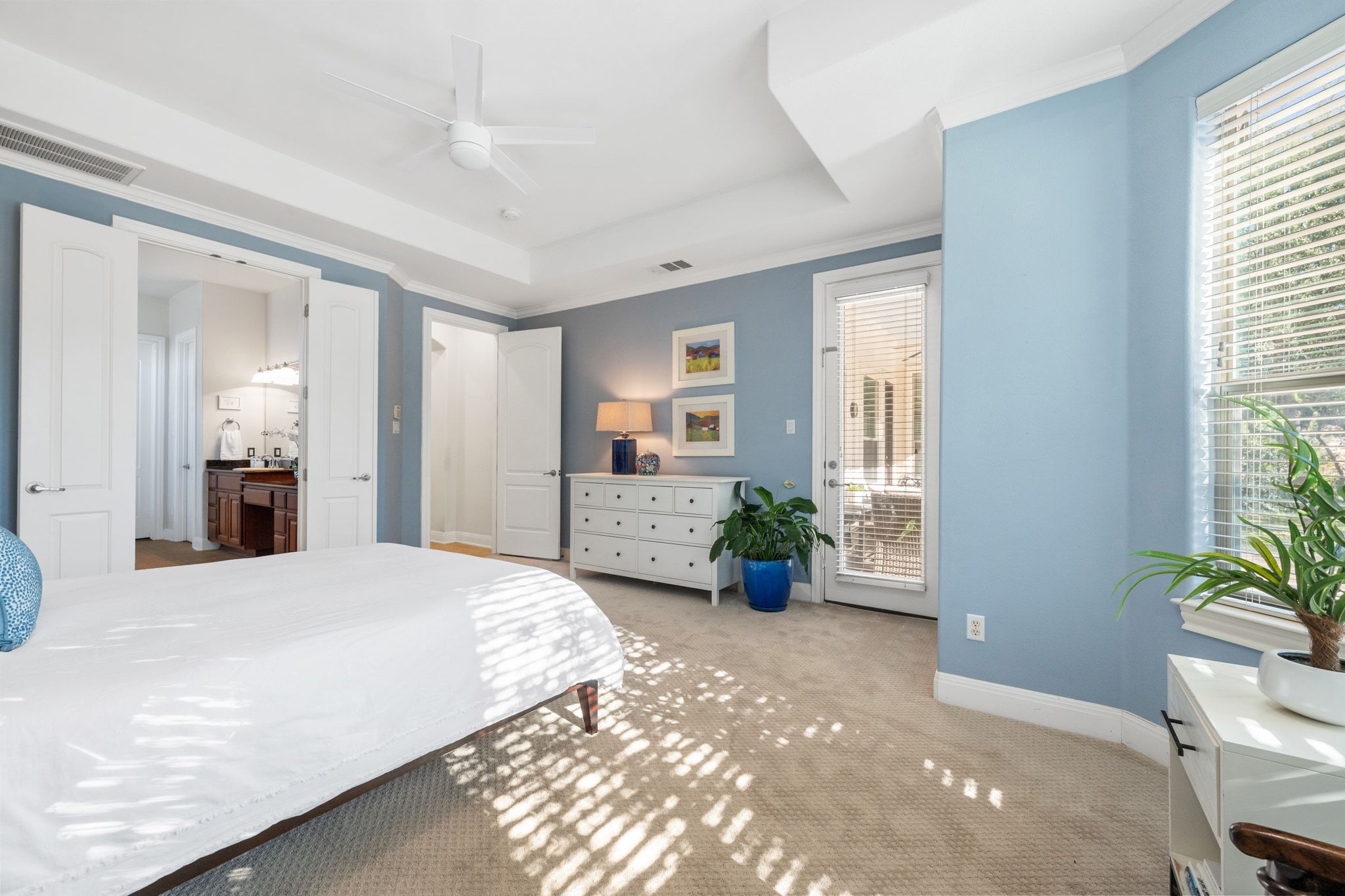 15201 Bat Hawk Circle Austin, TX 78738 - Photo 15 of 33 a bedroom with a bed and a couch