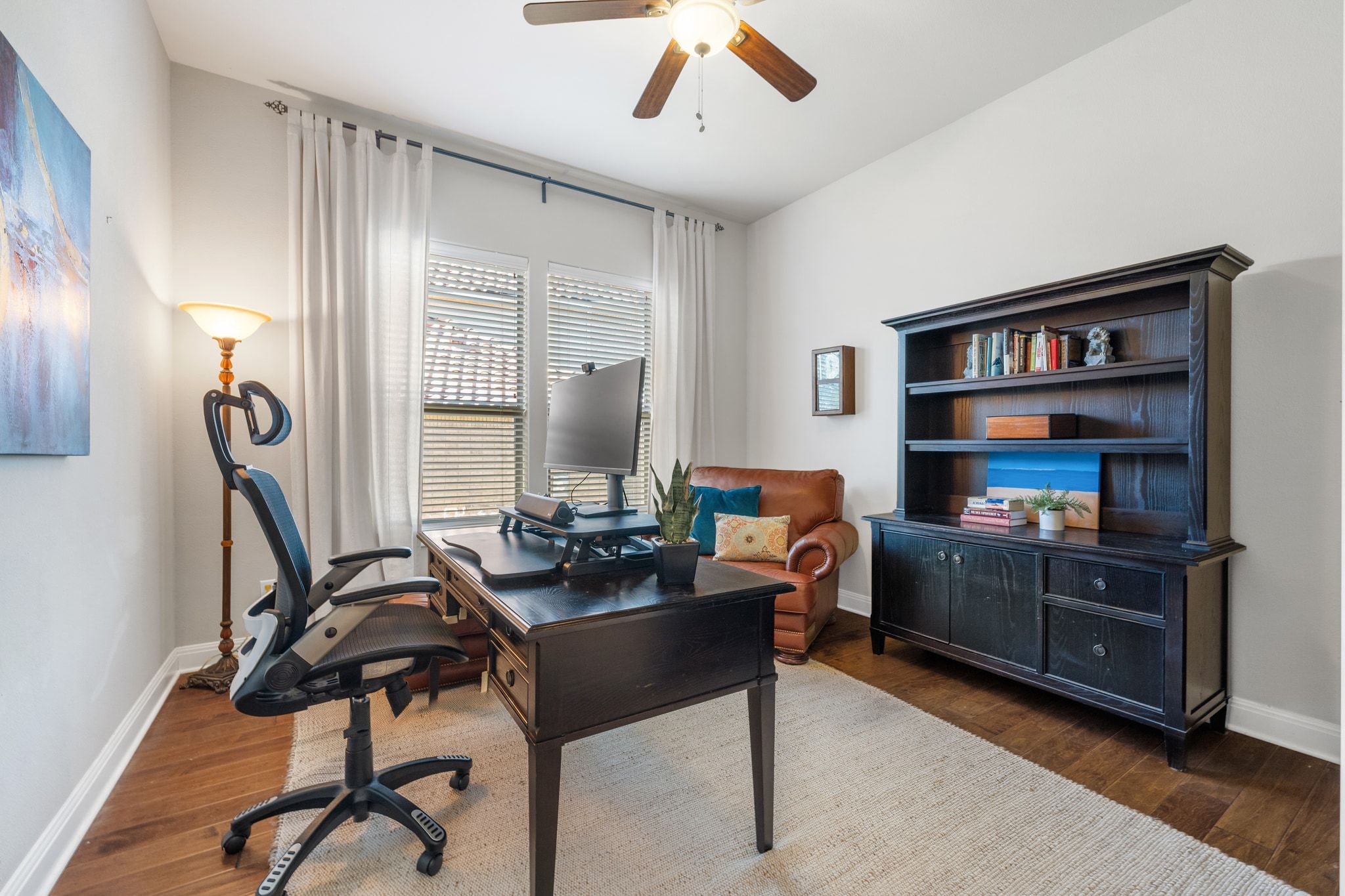 15201 Bat Hawk Circle Austin, TX 78738 - Photo 18 of 33 a view of a workspace with furniture