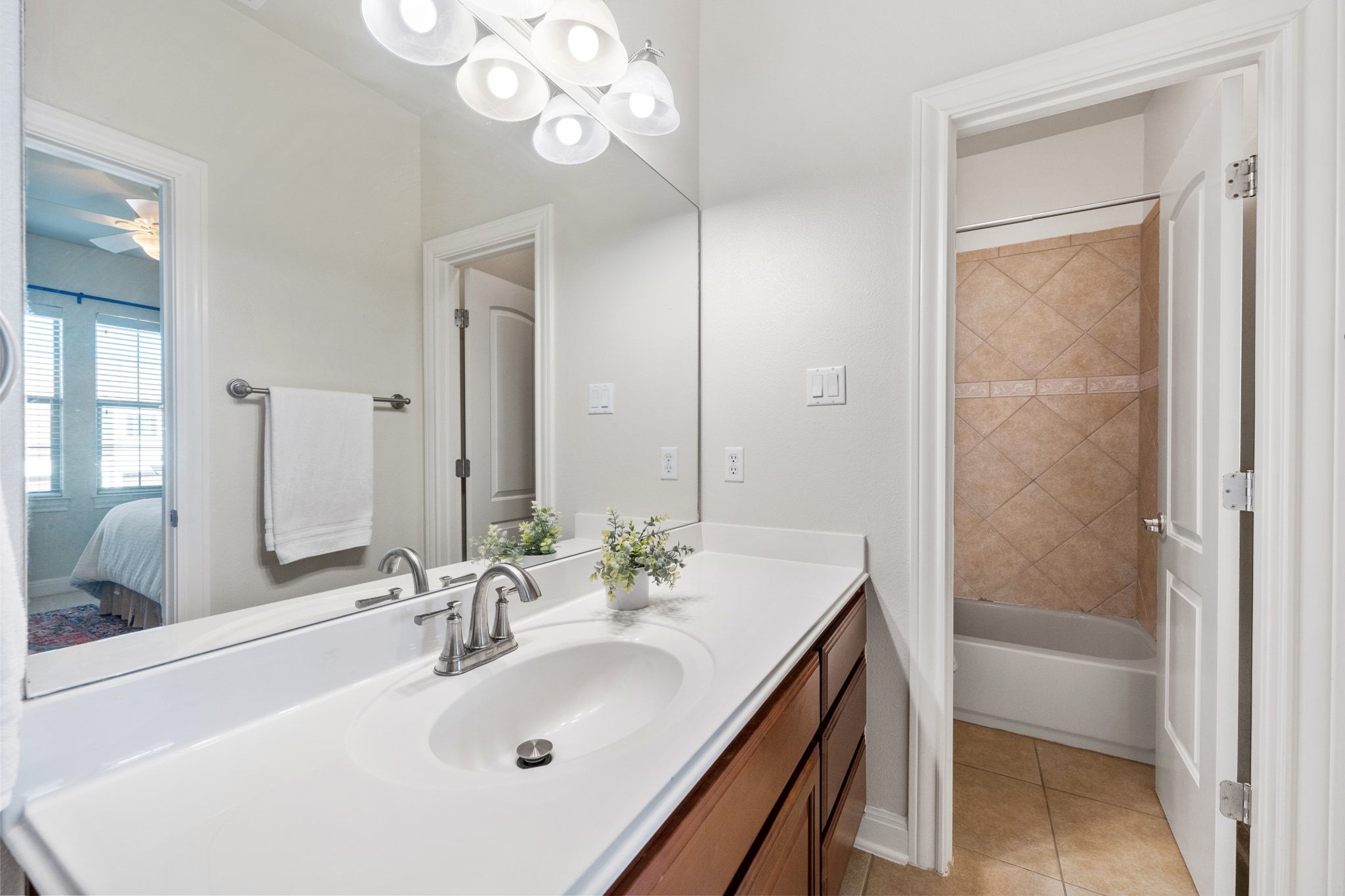 15201 Bat Hawk Circle Austin, TX 78738 - Photo 22 of 33 a bathroom with a sink a toilet and shower