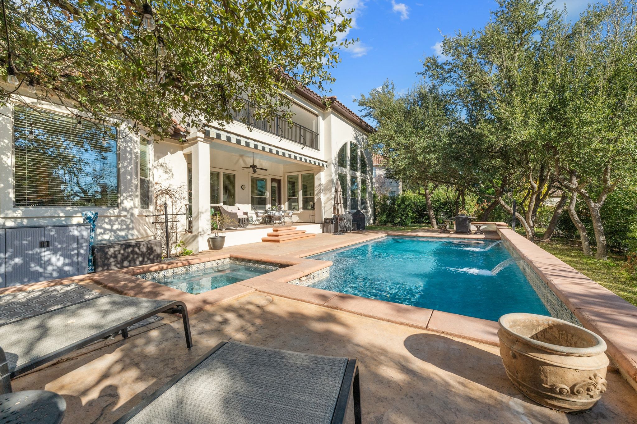 15201 Bat Hawk Circle Austin, TX 78738 - Photo 27 of 33 a view of a backyard with swimming pool