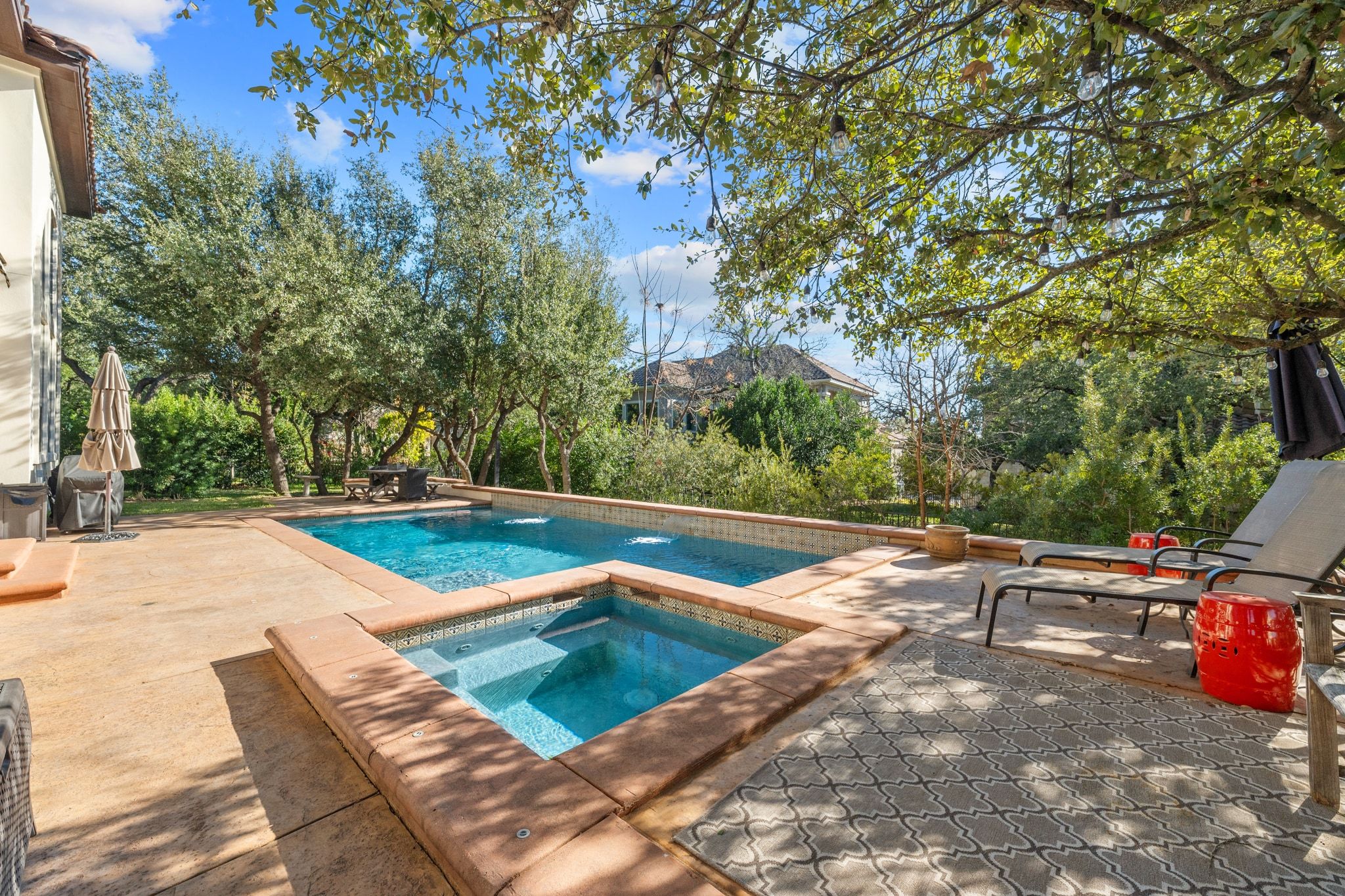 15201 Bat Hawk Circle Austin, TX 78738 - Photo 28 of 33 a view of a swimming pool with a yard