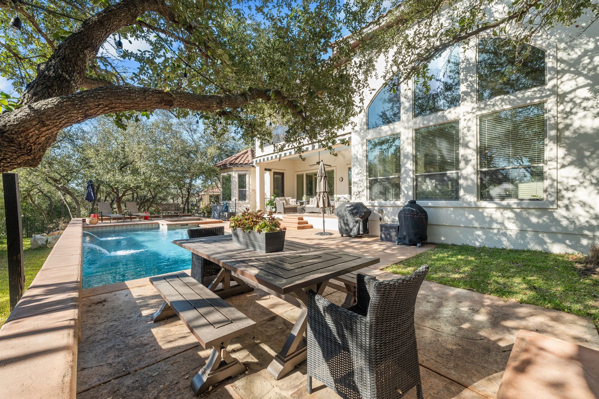 15201 Bat Hawk Circle Austin, TX 78738 - Photo 29 of 33 a view of backyard of house with seating area
