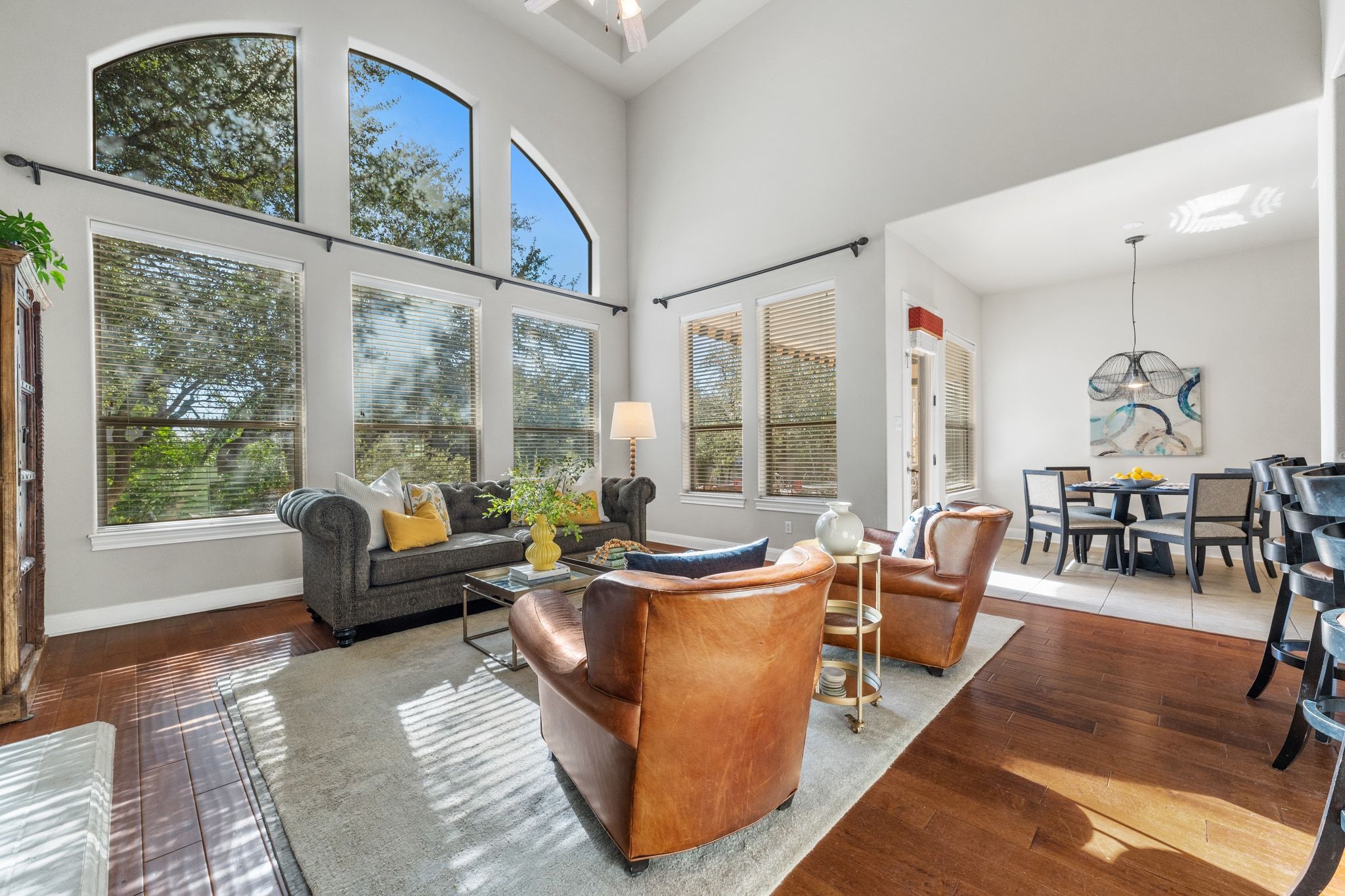 15201 Bat Hawk Circle Austin, TX 78738 - Photo 6 of 33 a living room with furniture and a large window
