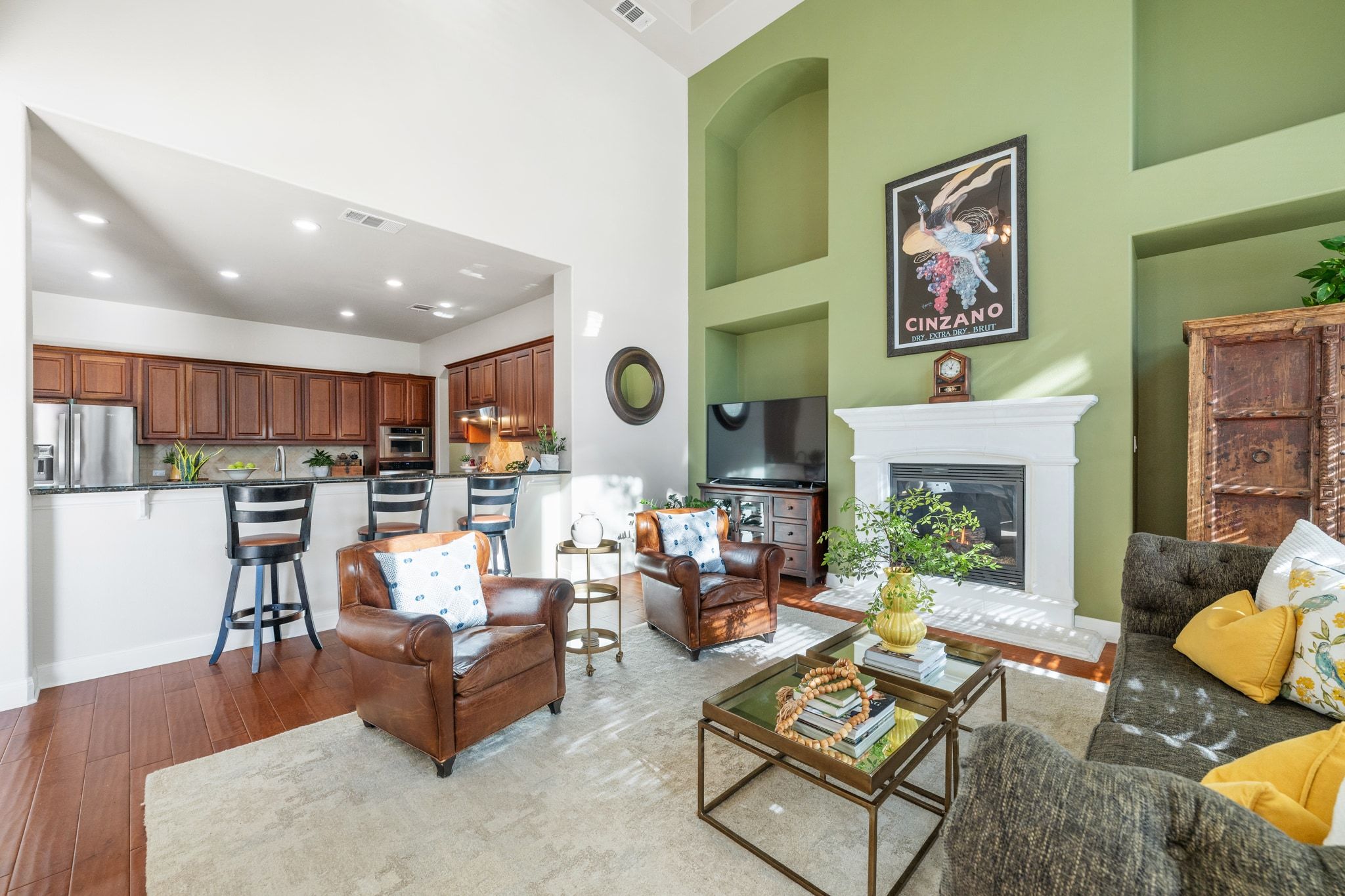 15201 Bat Hawk Circle Austin, TX 78738 - Photo 8 of 33 a living room with furniture kitchen view and a fireplace