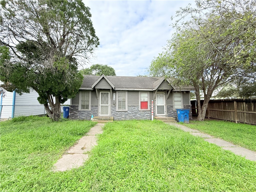 809 Cook, Unit A&B Odem, TX 78370 - Photo 12 of 12 a view of a house with a yard and sitting area