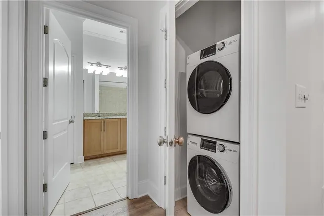 a view of a hallway with washer and dryer