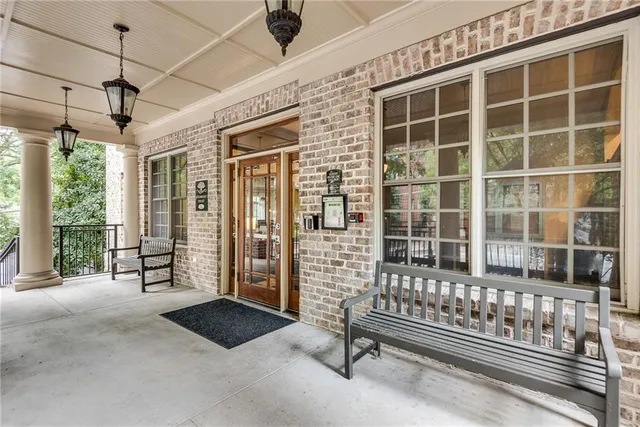 a view of a porch with a bench