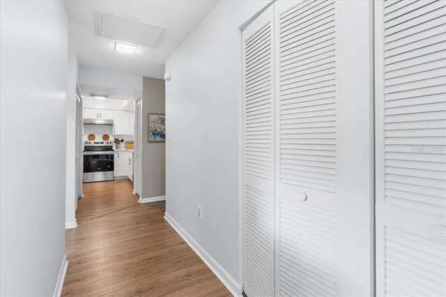 a kitchen with stainless steel appliances a sink stove and refrigerator
