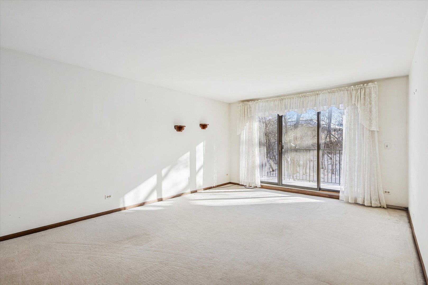 1-s150 Spring Road, Unit 2I Oak Brook, IL 60181 - Photo 14 of 16 a view of an empty room with a window