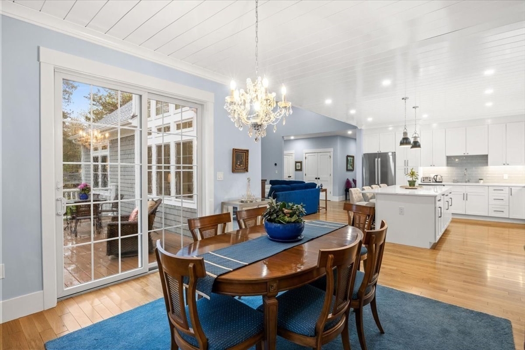 36 Ralyn Road Barnstable, MA 02635 - Photo 14 of 39 a view of a dining room with furniture window and wooden floor