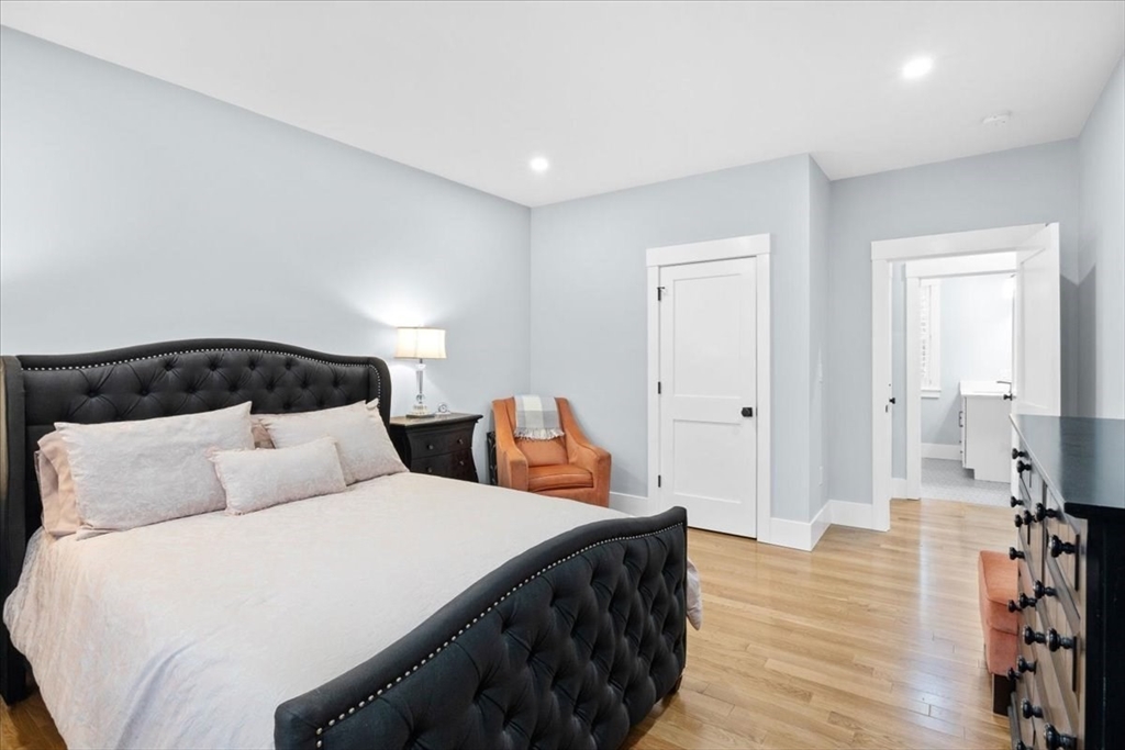 36 Ralyn Road Barnstable, MA 02635 - Photo 33 of 39 a bedroom with a bed and wooden floor