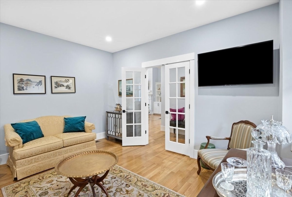 36 Ralyn Road Barnstable, MA 02635 - Photo 4 of 39 a living room with furniture and a flat screen tv