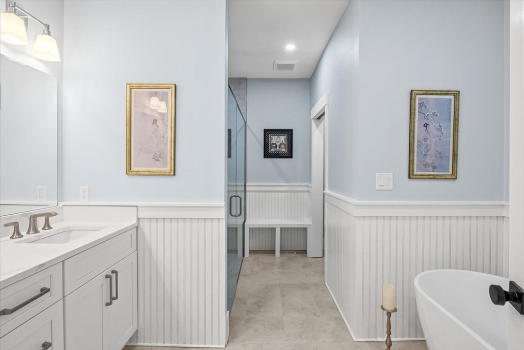 36 Ralyn Road Barnstable, MA 02635 - Photo 9 of 39 a bathroom with a sink and a mirror