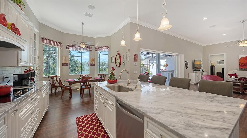 20 Bayhead Lane Osprey, FL 34229 - Photo 14 of 72 a kitchen with sink and view of living room